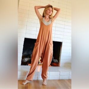 Coral/pink free people hot shot romper